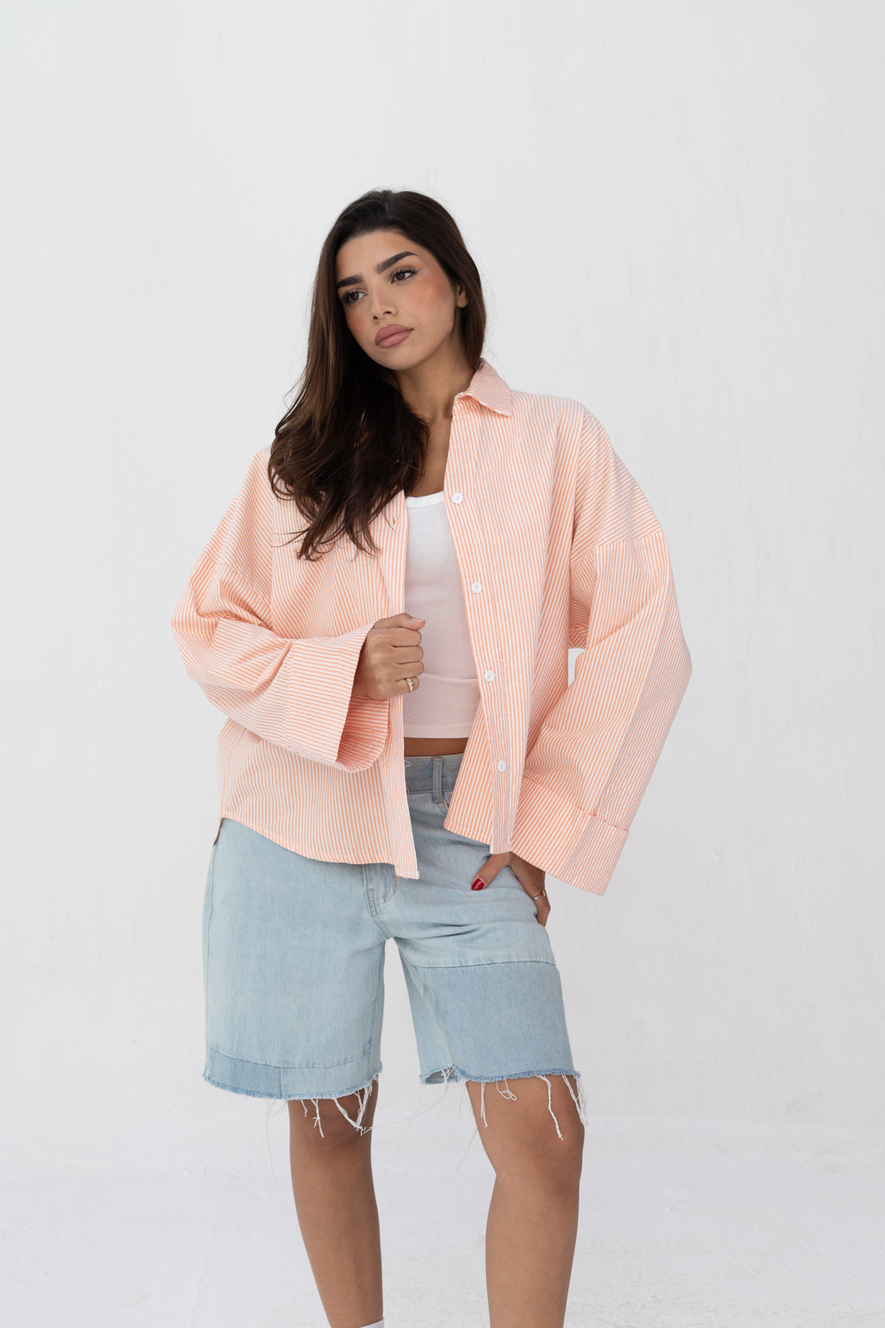 Subtle striped blouse with back bleats