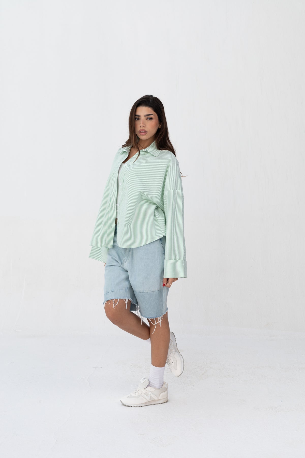Subtle striped blouse with back bleats