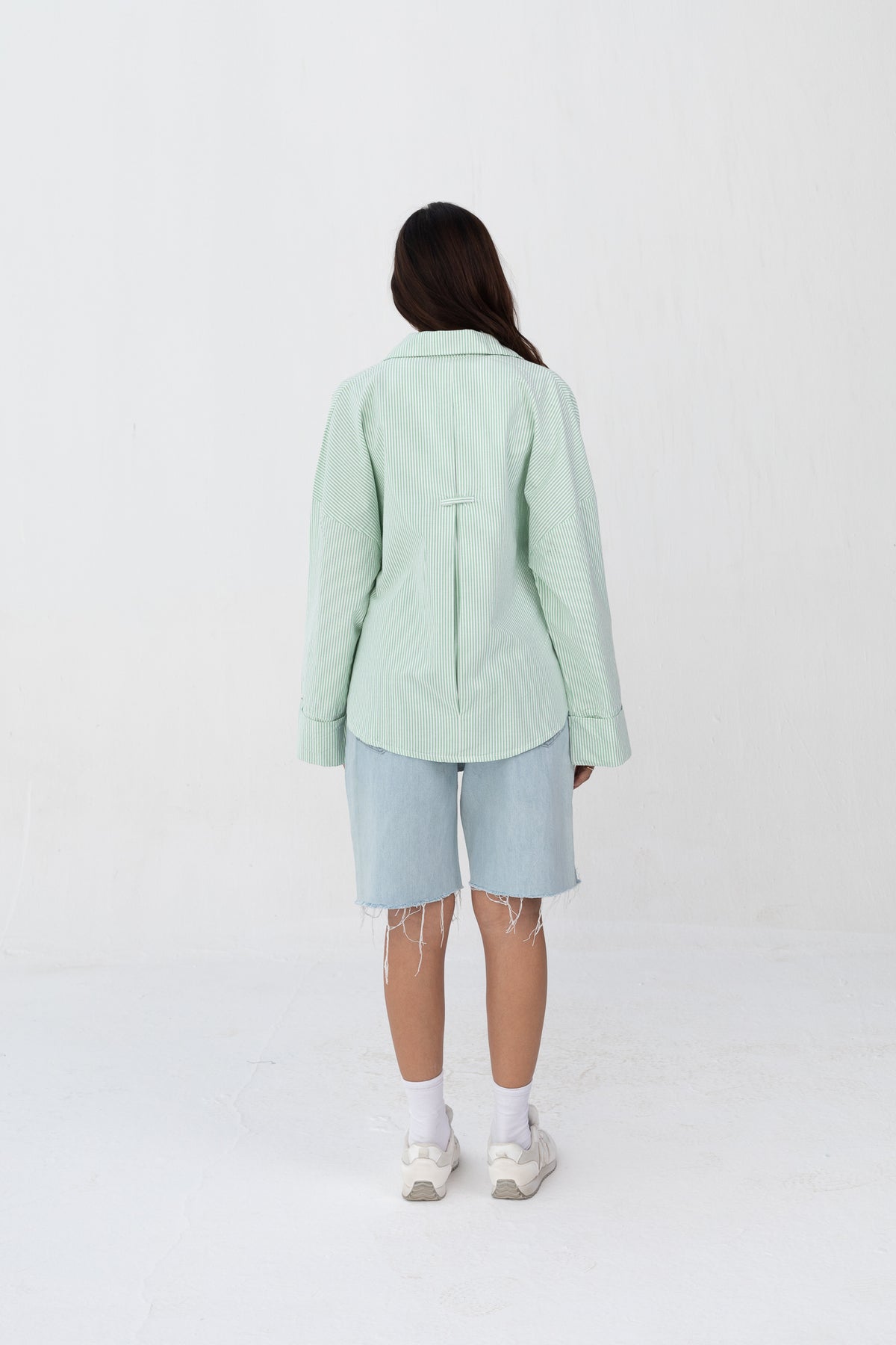 Subtle striped blouse with back bleats